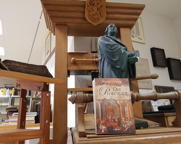 Martin Luther mit der Buchpresse. Foto: lk/Landgraf.