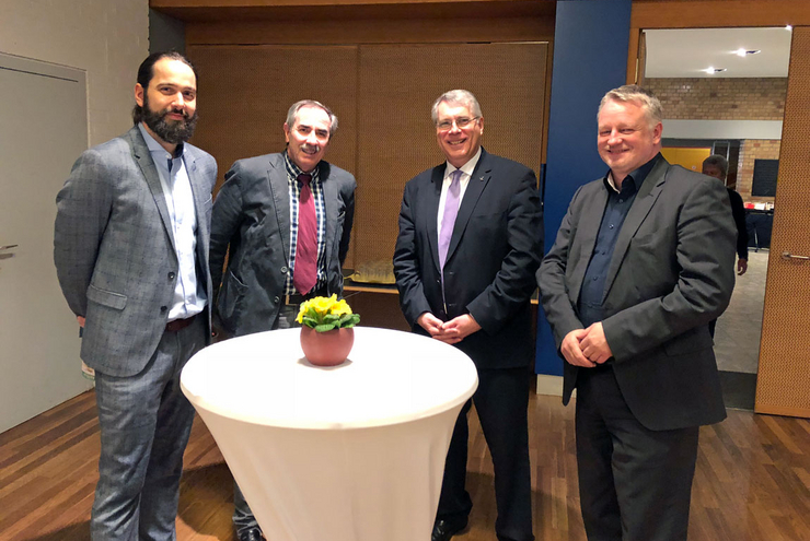 Bildungs- und Kulturminister Ulrich Commerçon, Kirchenpräsident Christian Schad, Dekan i.R. Fritz Höhn und Christian Weber von der Karlsberg Brauerei (v.re.). 